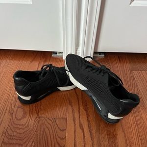 Platform black and white sneakers.